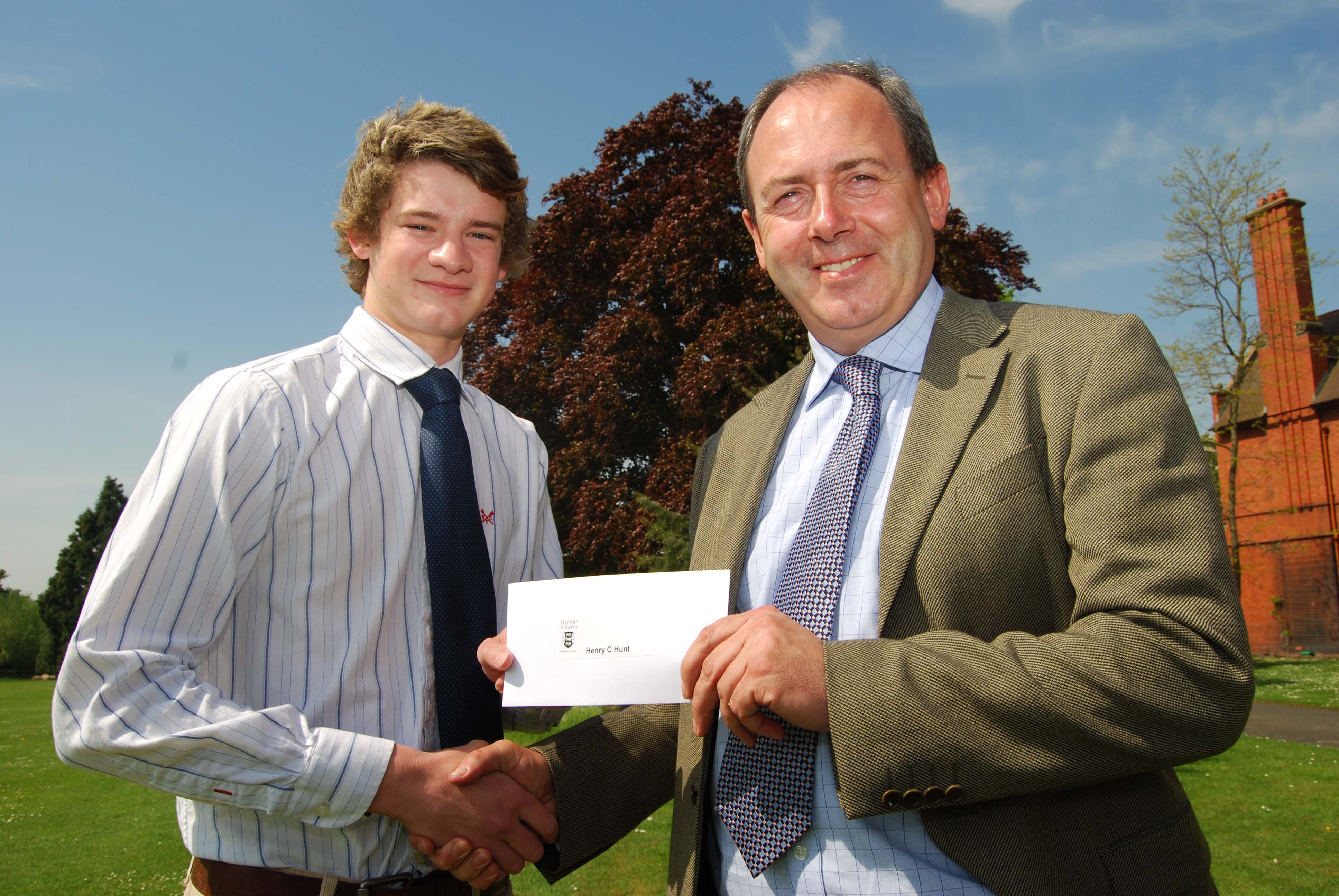 Henry Hunt receives his prize from Tony Asson